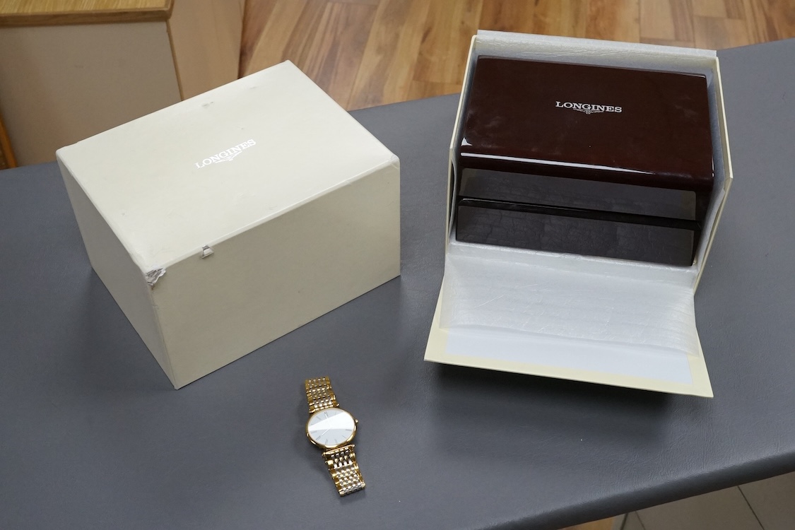 A gentleman's gtwo tone gilt steel Longines L4709-2 Le Grand Classique quartz dress wrist watch, with Roman dial, case diameter 33mm, boxed